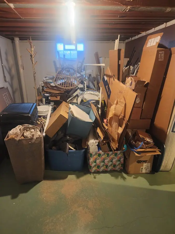 Roll-off dumpster container at job site for 2 Yard Dumpster Rental in June Park